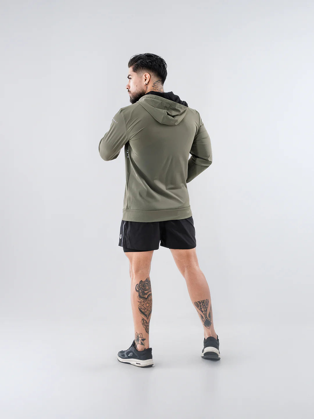 Chaqueta deportiva hombre verde militar TENFIT Velox - vista posterior