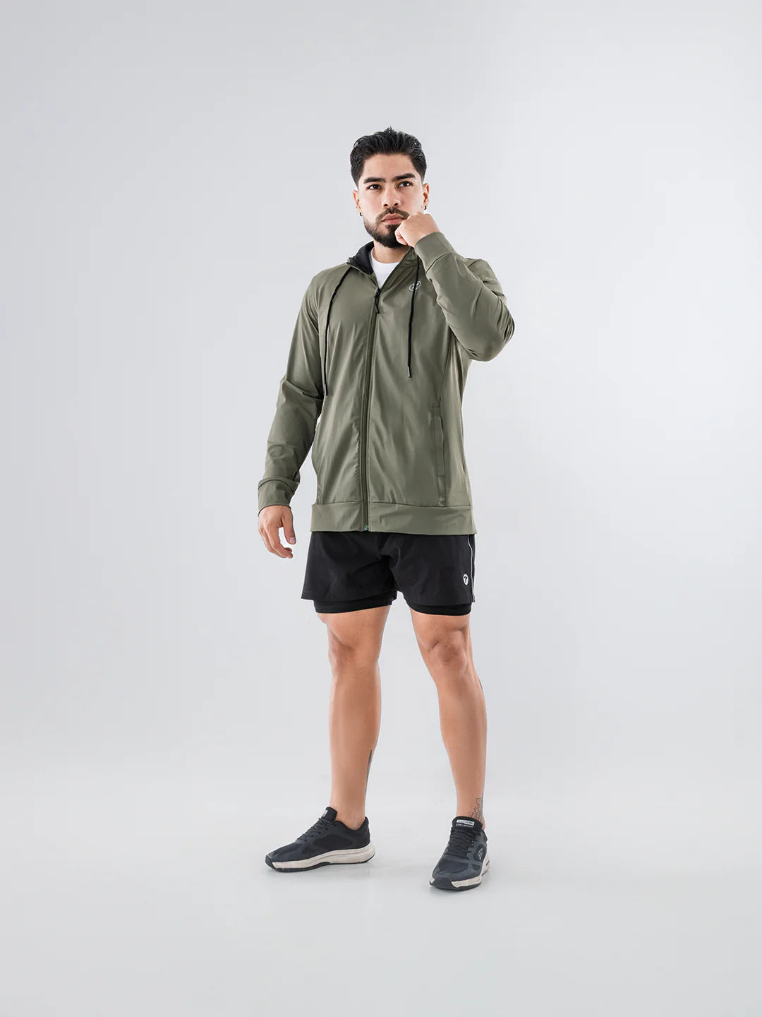 Chaqueta running TENFIT Velox verde militar - corte ergonómico hombre
