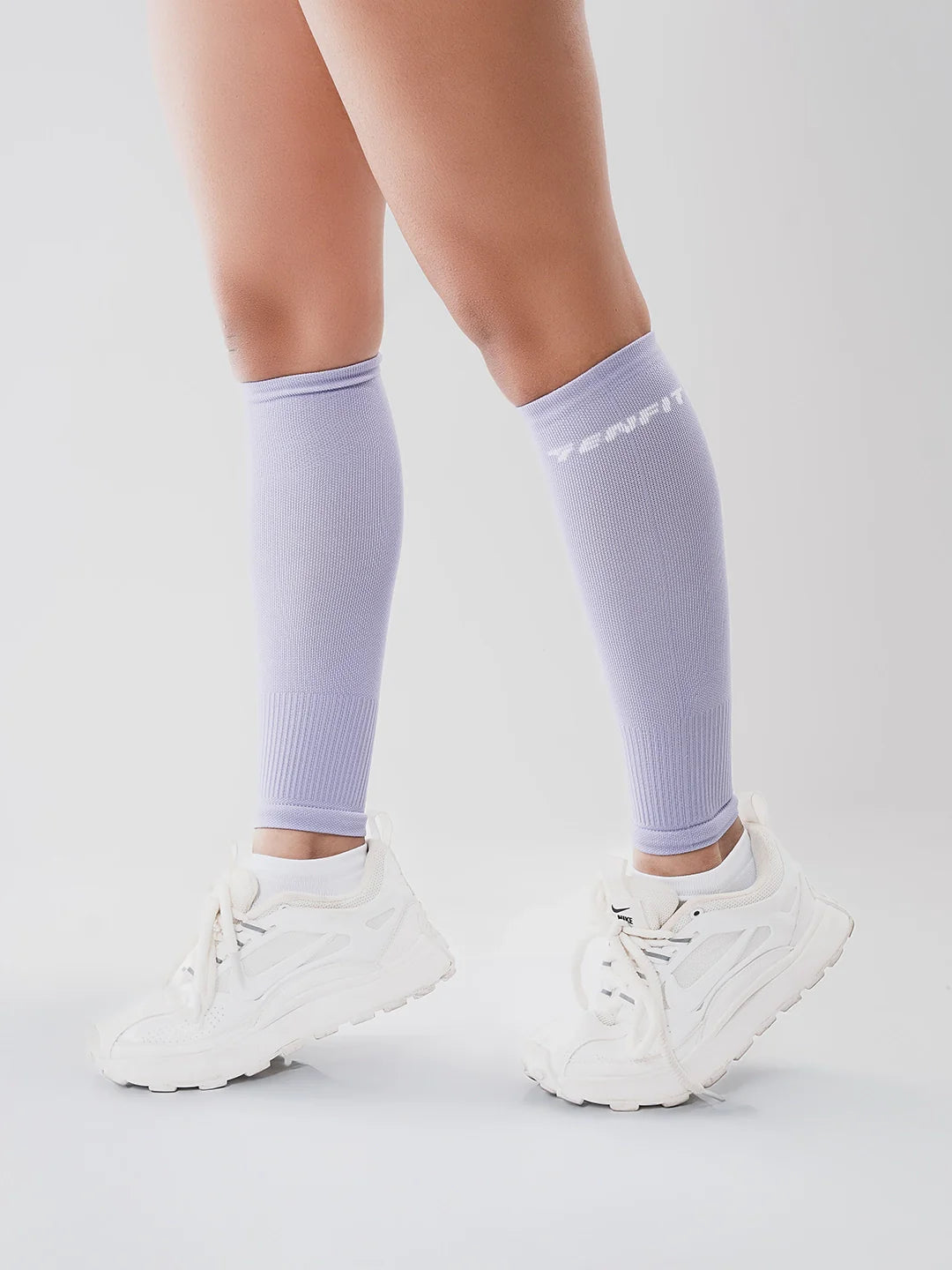 Pantorrillera de compresión lila oscuro TENFIT para running y ciclismo — Colombia