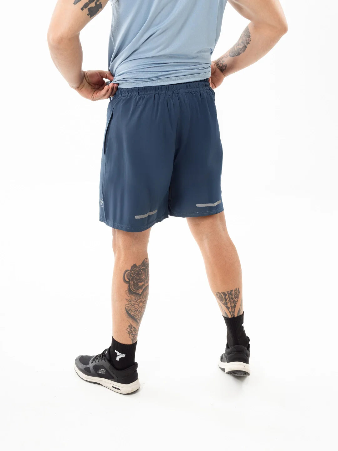 Pantaloneta NitroFit hortensia oscuro atrás hombre TENFIT