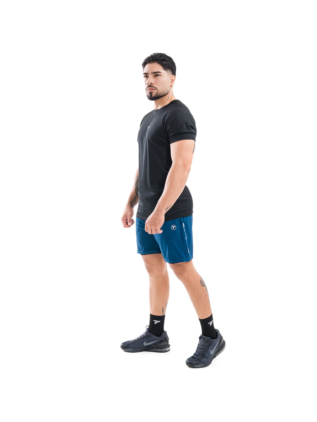 Pantaloneta NitroFit azul petróleo lado hombre TENFIT
