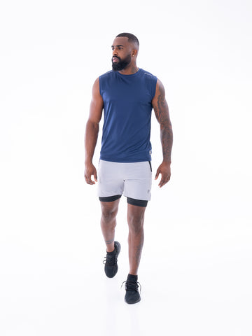 Camiseta sin manga azul turquí hombre gym — TENFIT Astro