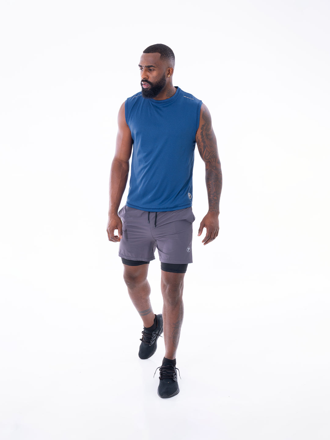 Camiseta sin manga azul turqui jaspe hombre gym — TENFIT Astro