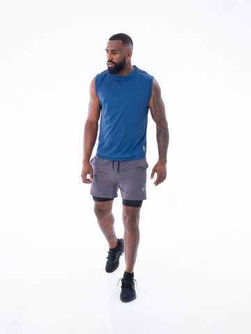 Camiseta sin manga azul turqui jaspe hombre gym — TENFIT Astro