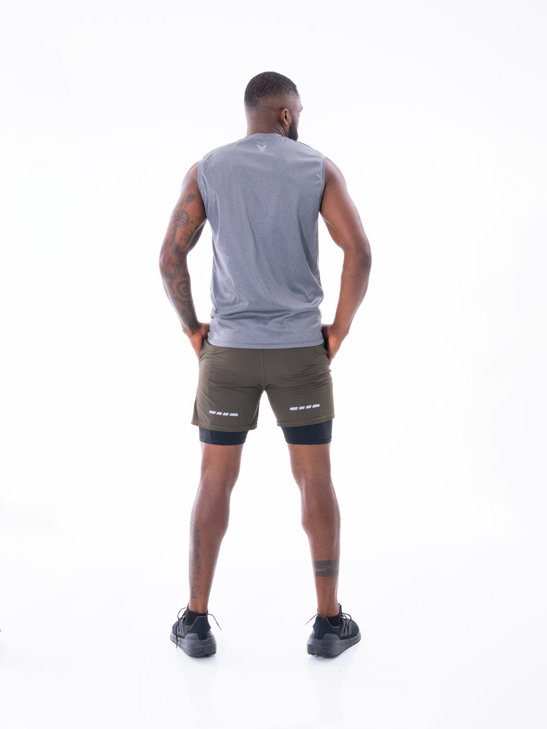 Camiseta deportiva espalda gris jaspe hombre — TENFIT Colombia