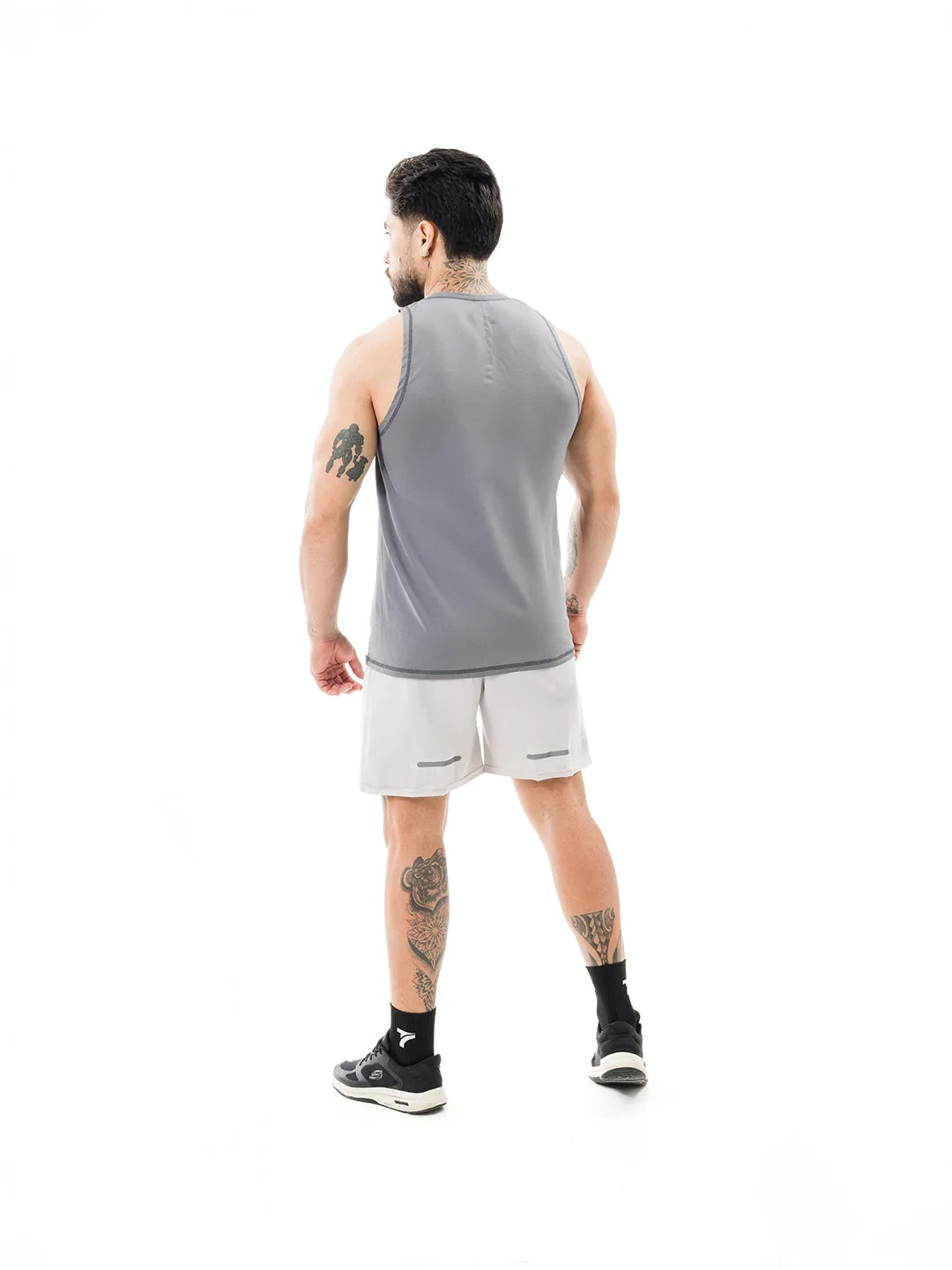 Camisilla running gris oscuro vista posterior hombre - TENFIT