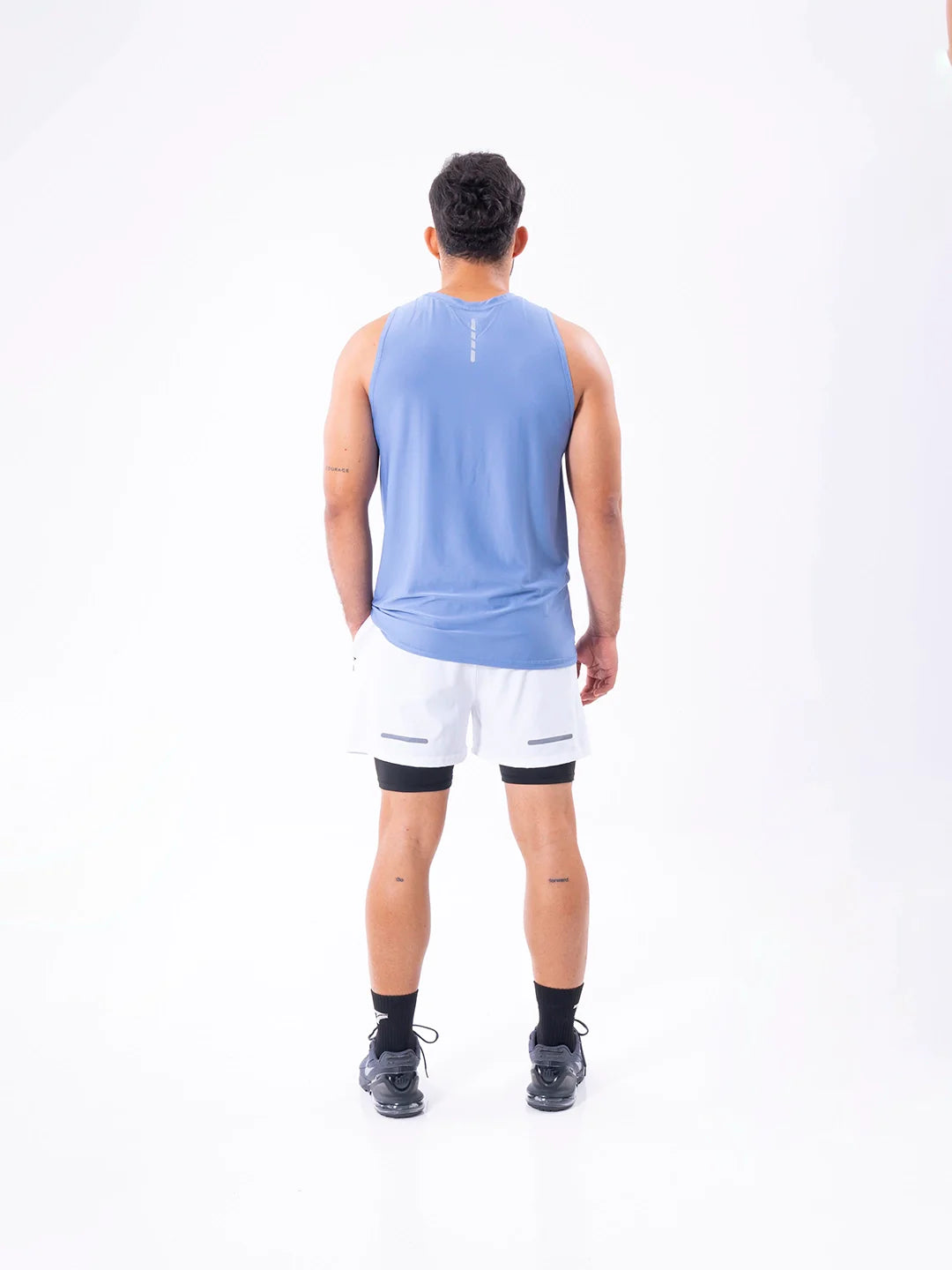 Camisilla running hortensia claro vista posterior hombre - TENFIT