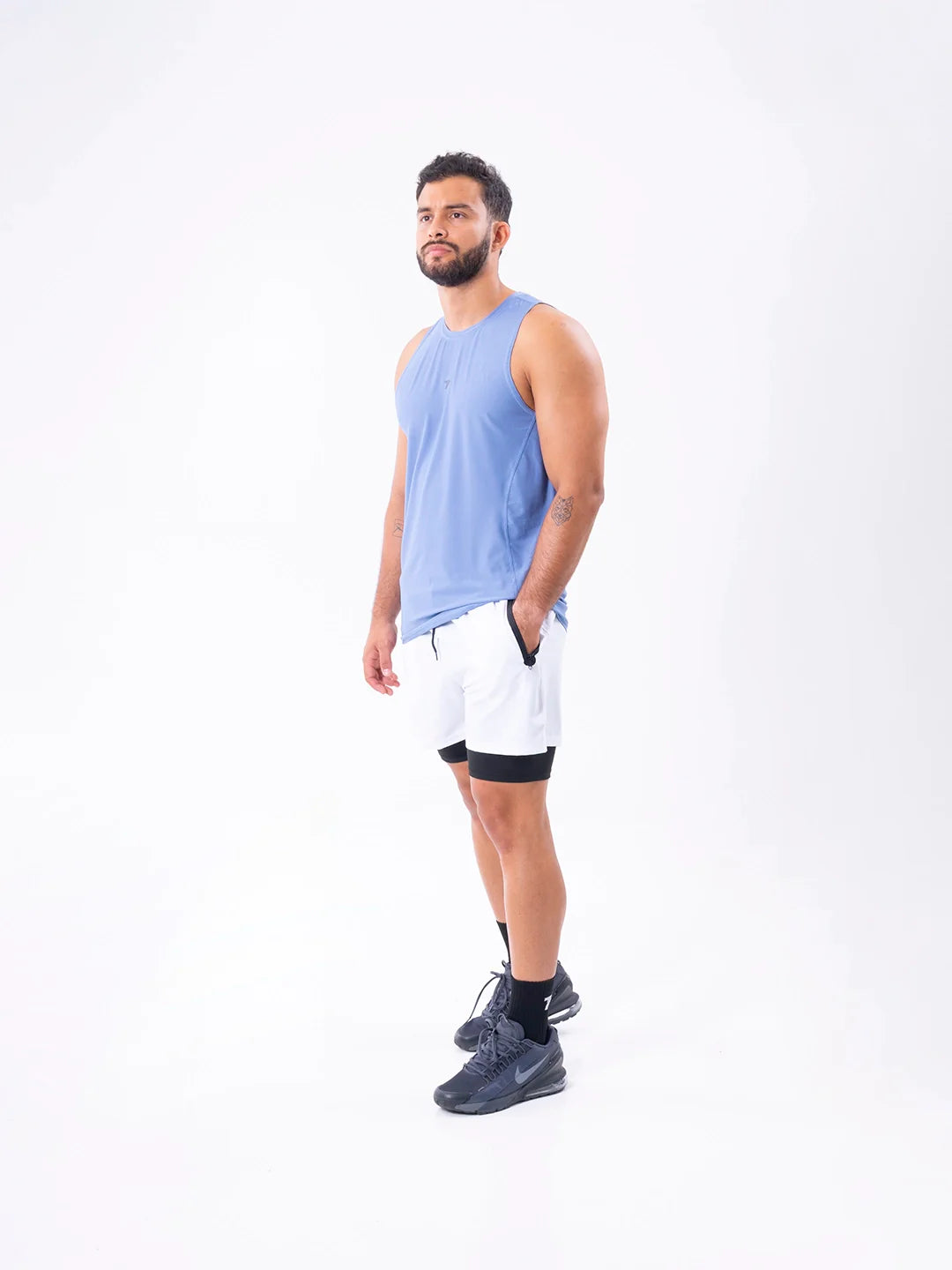 Camisilla Running Hortensia Claro hombre frente - TENFIT Colombia