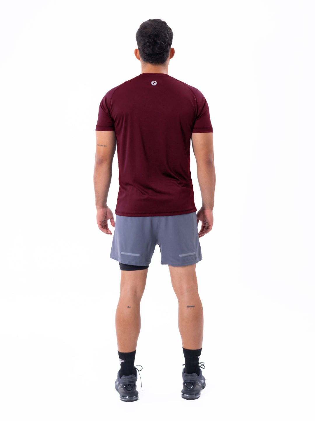 Tejido ultraligero camiseta vinotinto deportiva hombre TENFIT - detalle tela