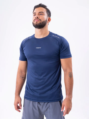 Camiseta deportiva azul turquí regular fit hombre TENFIT - vista frontal