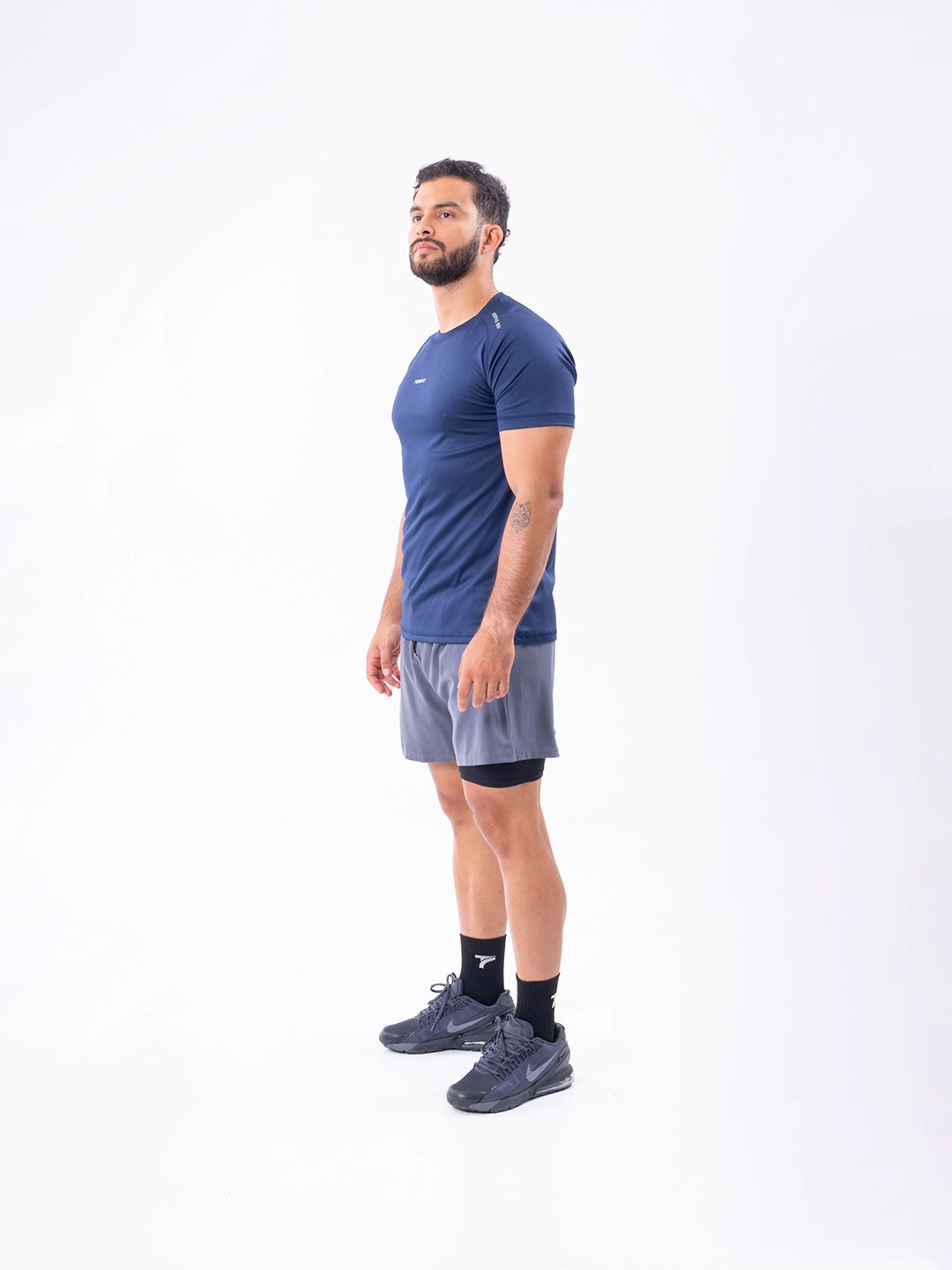 Camiseta azul turquí regular fit hombre para running y aire libre TENFIT