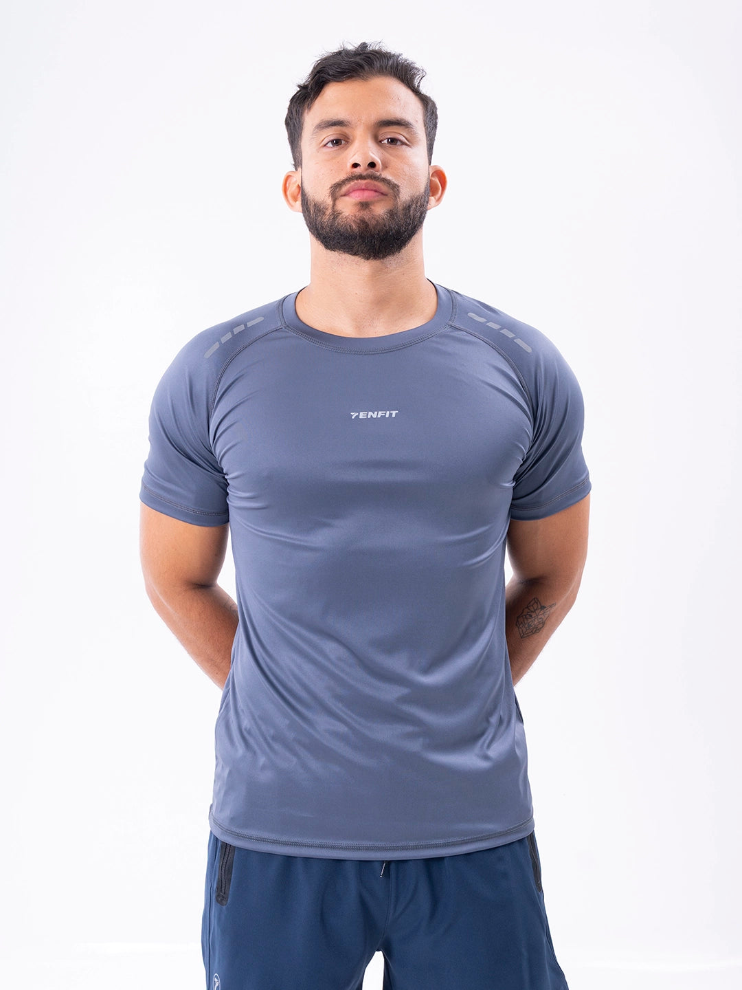 Camiseta deportiva gris oscuro regular fit hombre TENFIT - vista frontal