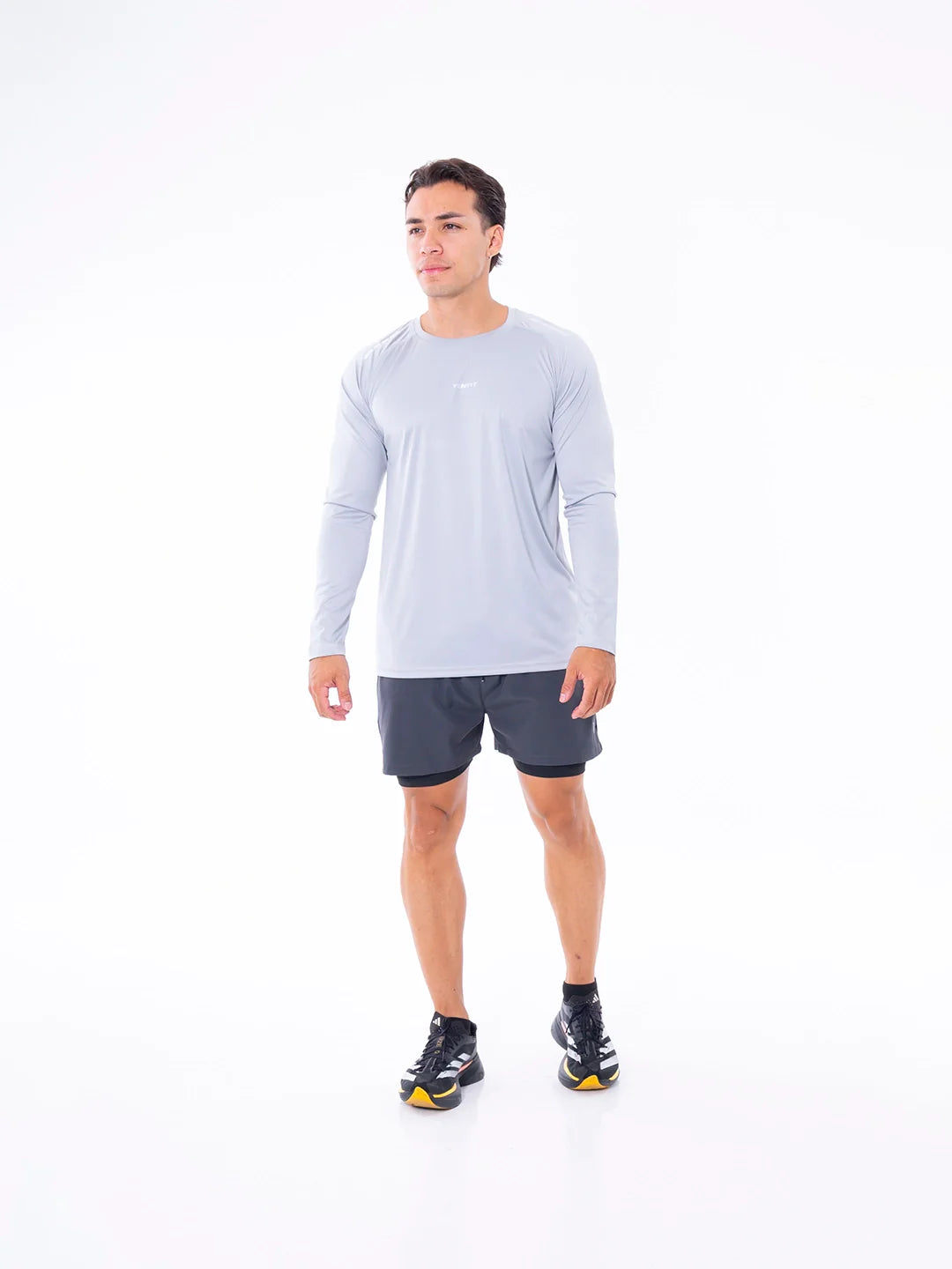 Buzo gris claro regular fit hombre gym entrenamiento TENFIT Colombia
