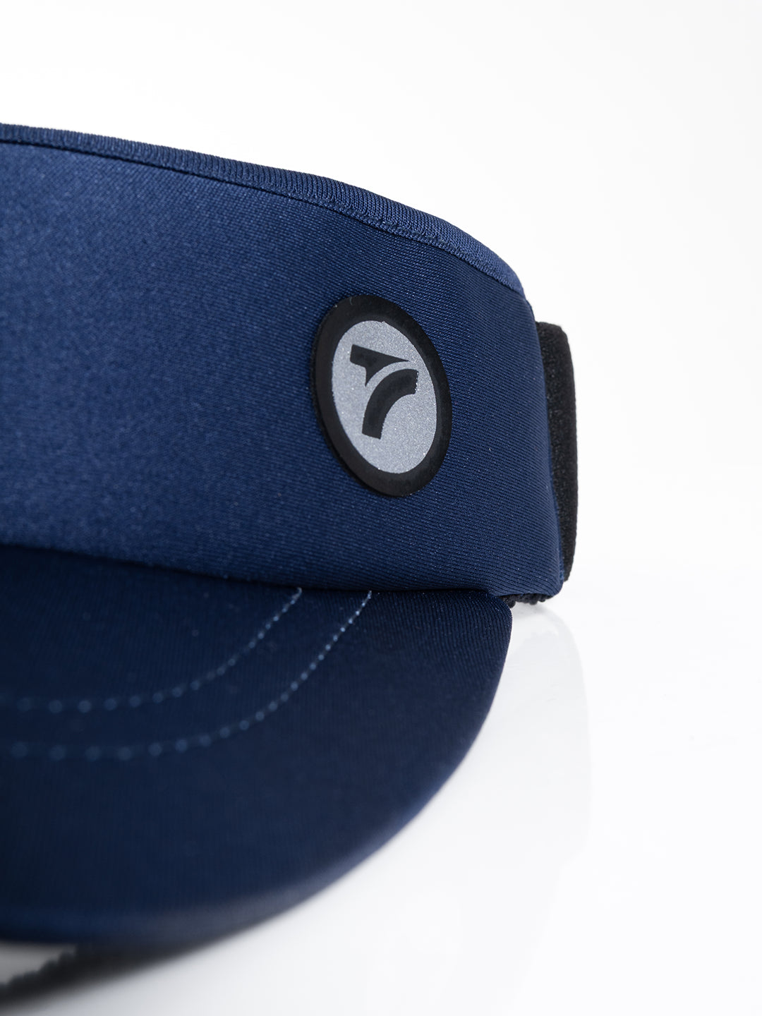 Visera running azul turquí AYRA detalles tela TENFIT