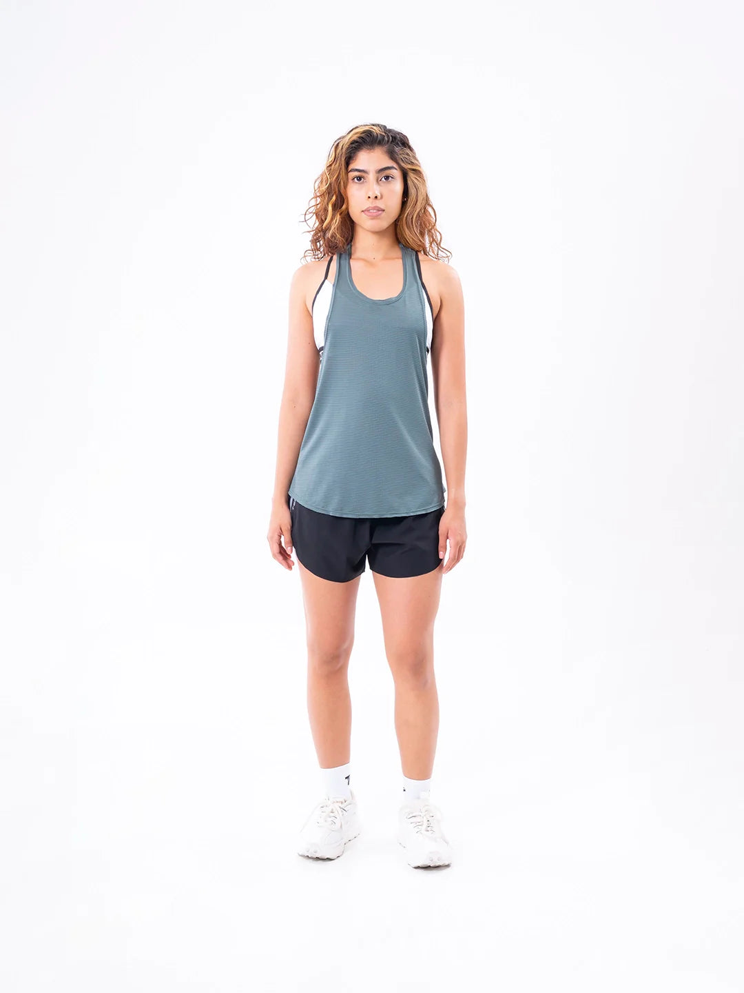 Esqueleto verde oliva oscuro frente lado mujer TENFIT Air Run