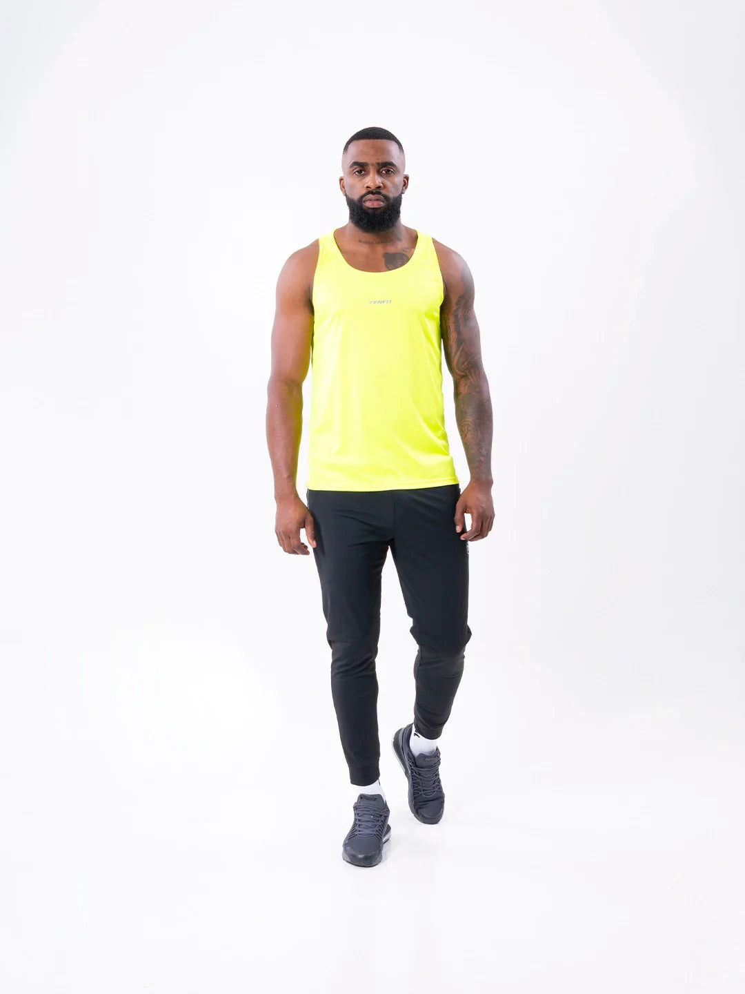 Camisilla deportiva amarillo neón sin mangas hombre gym TENFIT