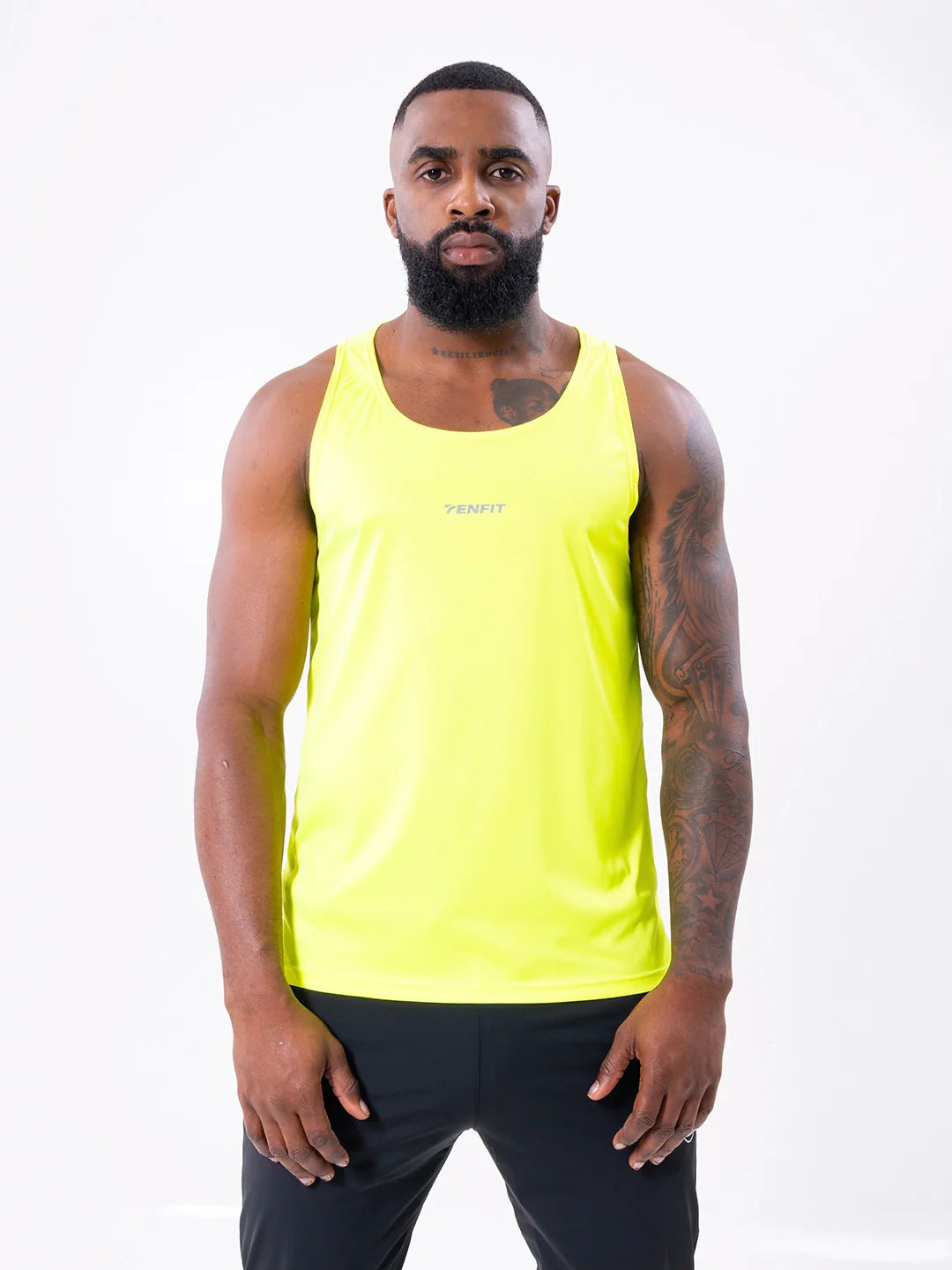 Camisilla deportiva amarillo neón sin mangas hombre gym TENFIT