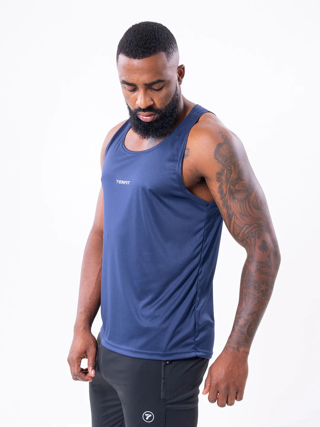 Camisilla deportiva azul turquí sin mangas hombre gym TENFIT
