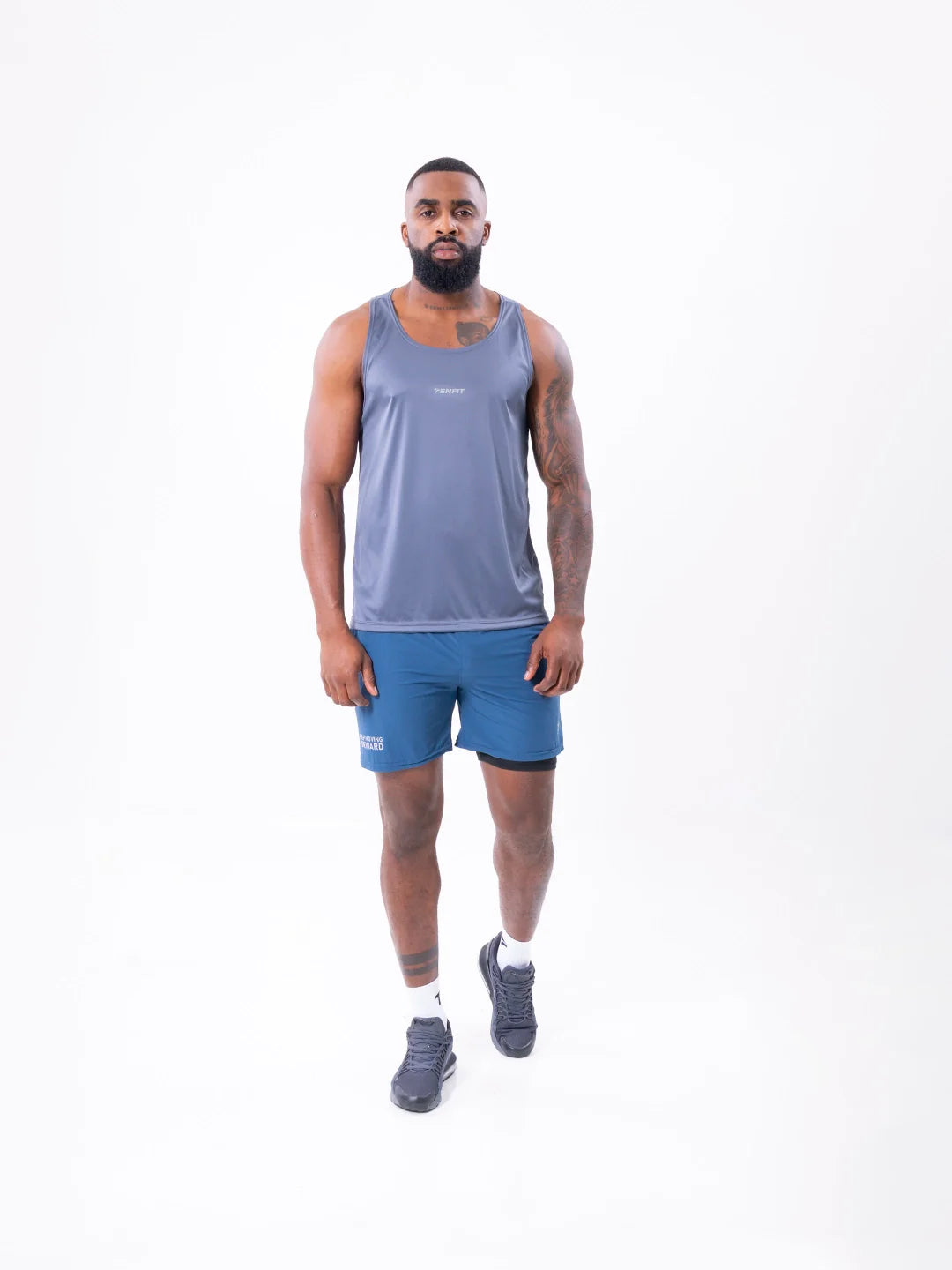 Camisilla Velocity gris oscuro espalda hombre entrenamiento TENFIT