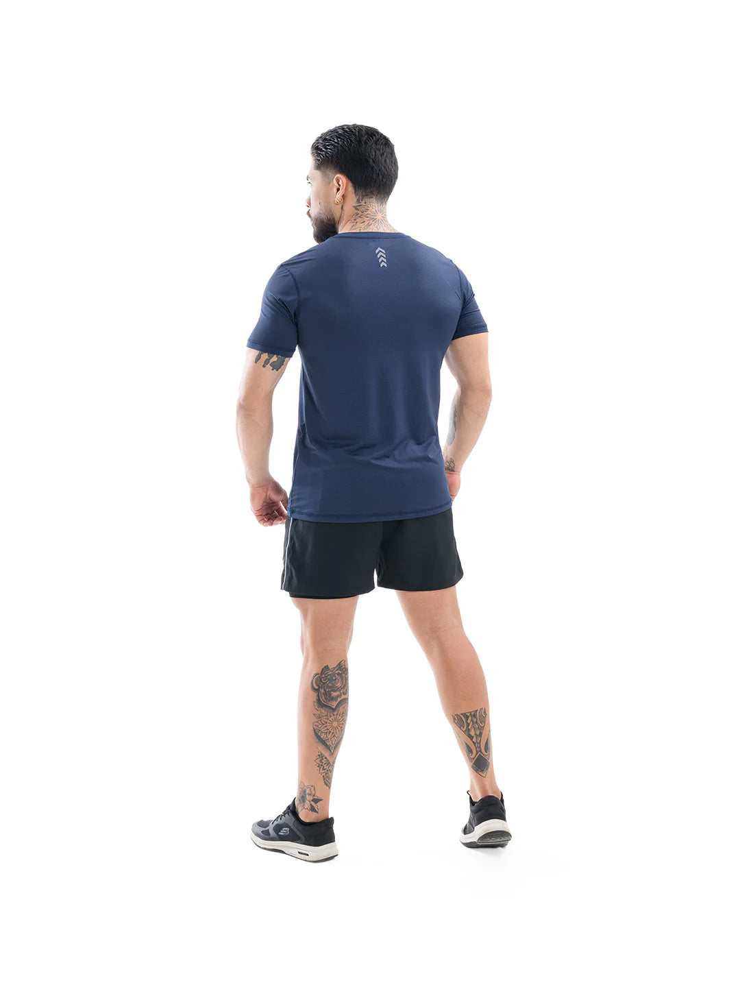 Camiseta running hombre azul turquí espalda TENFIT Colombia