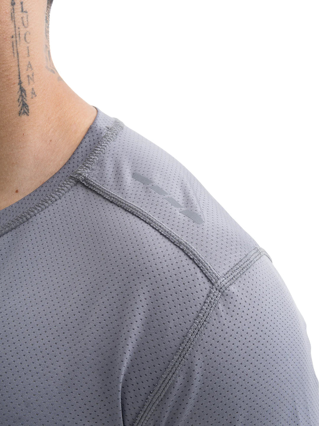 Tejido transpirable camiseta gris oscuro deportiva hombre TENFIT