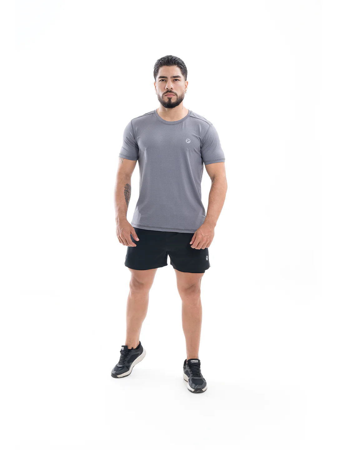 Camiseta running gris oscuro hombre TENFIT frente perfil
