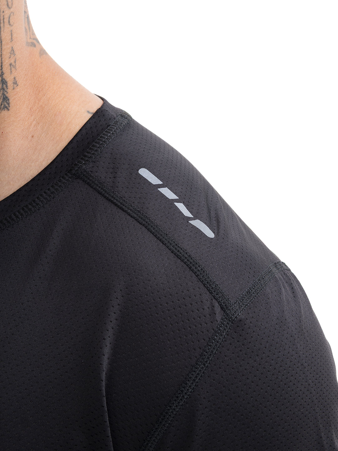 Tejido transpirable camiseta negra deportiva hombre TENFIT