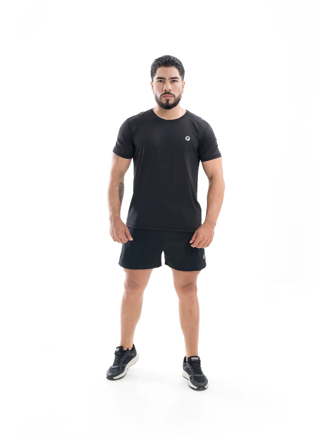 Camiseta running negra hombre TENFIT frente perfil
