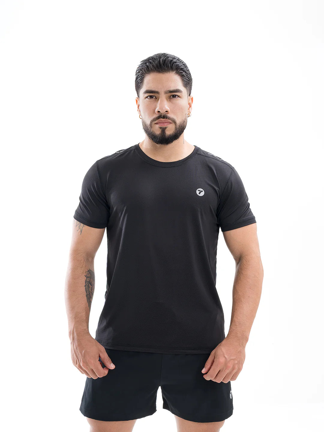Camiseta running negra hombre TENFIT frente perfil