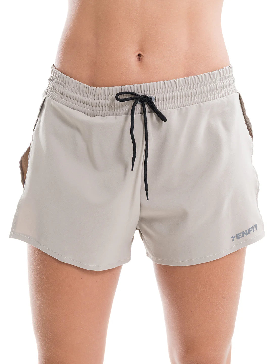 Short deportivo almendra mujer TENFIT Fly Run - vista frontal