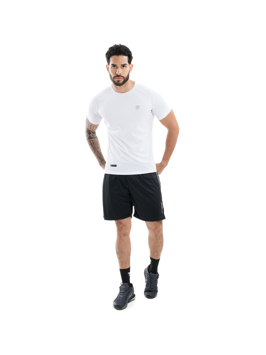 Camiseta gym hombre blanca secado rápido TENFIT - corte ergonómico