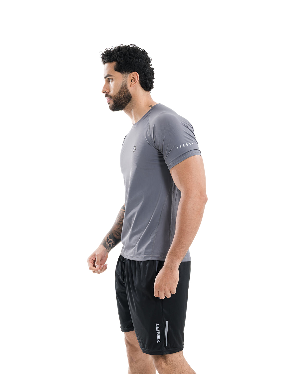 Camiseta running gris oscuro hombre TENFIT - tejido técnico Colombia