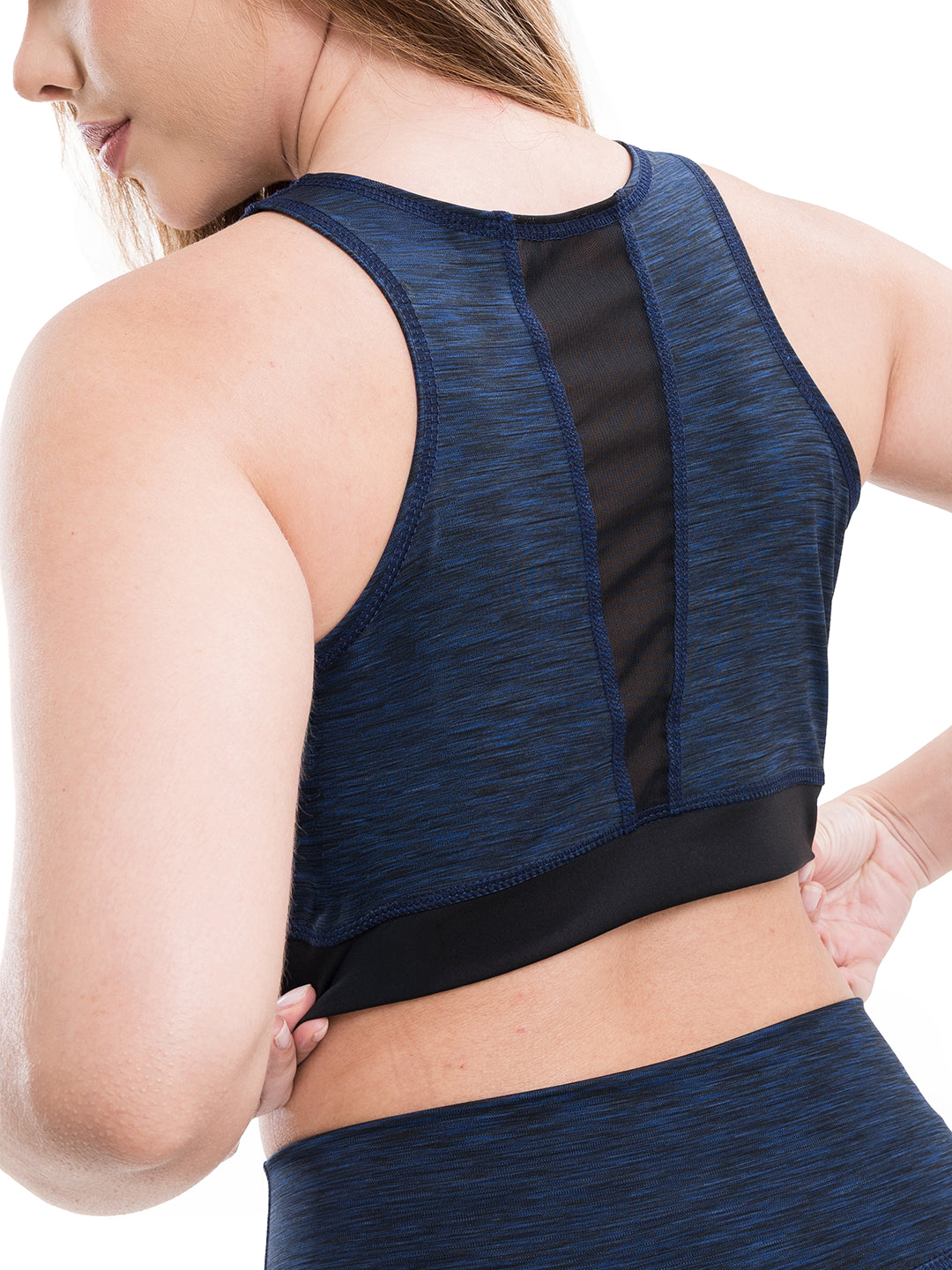 Detalle tela nylon cationic conjunto azul turquí jaspe ropa deportiva mujer TENFIT vista posterior