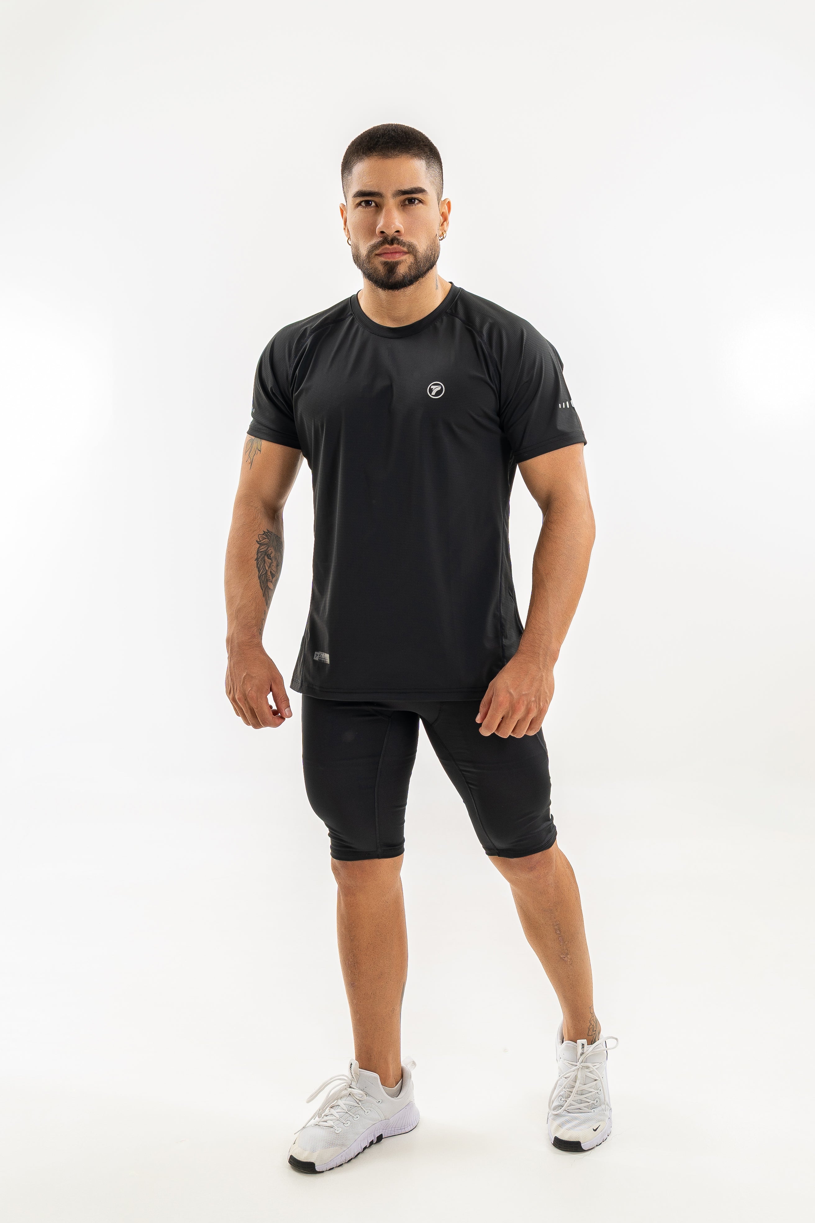 Licra deportiva negra bolsillo funcional para running