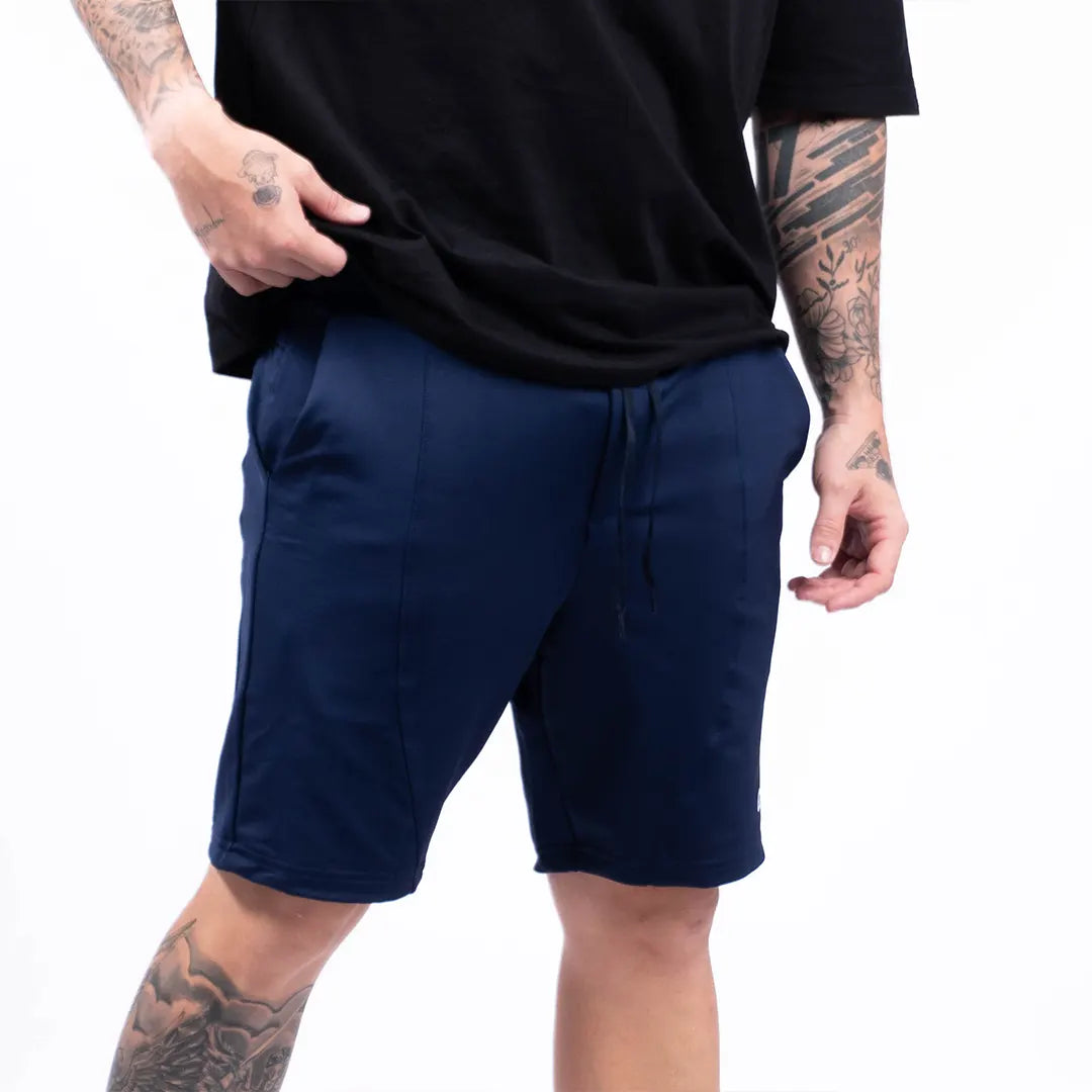 Pantaloneta urbana azul turquí hombre TENFIT frente