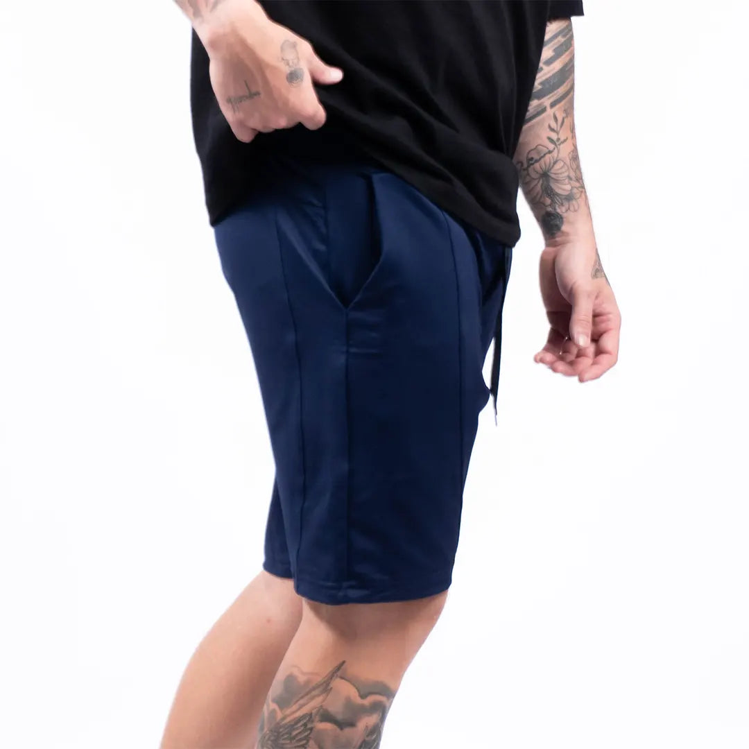 Pantaloneta urbana azul turquí hombre TENFIT vista lateral