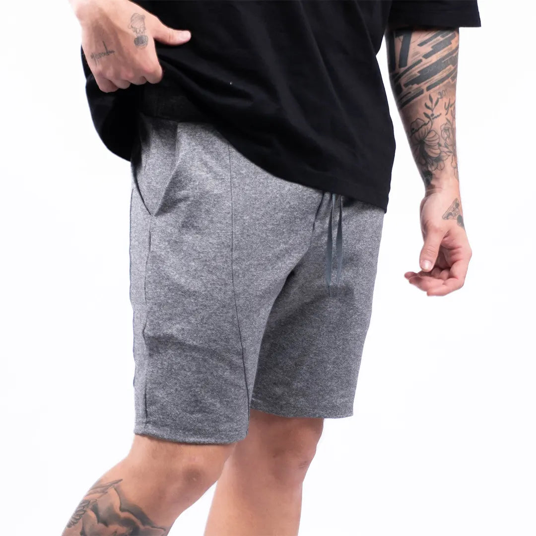 Pantaloneta urbana gris jaspe oscuro hombre TENFIT