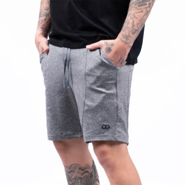 Pantaloneta urbana gris jaspe oscuro hombre TENFIT