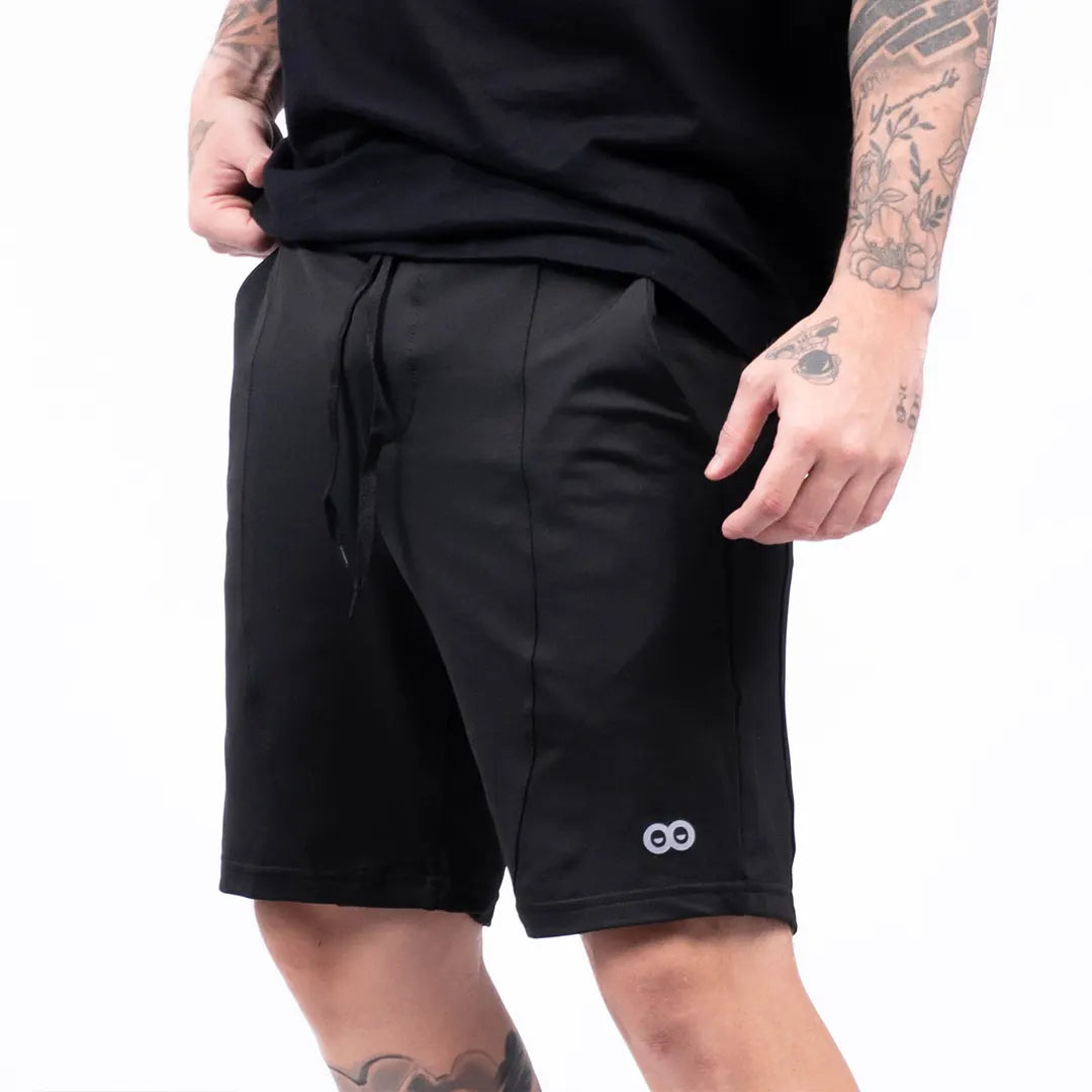 Pantaloneta urbana negra hombre TENFIT frente