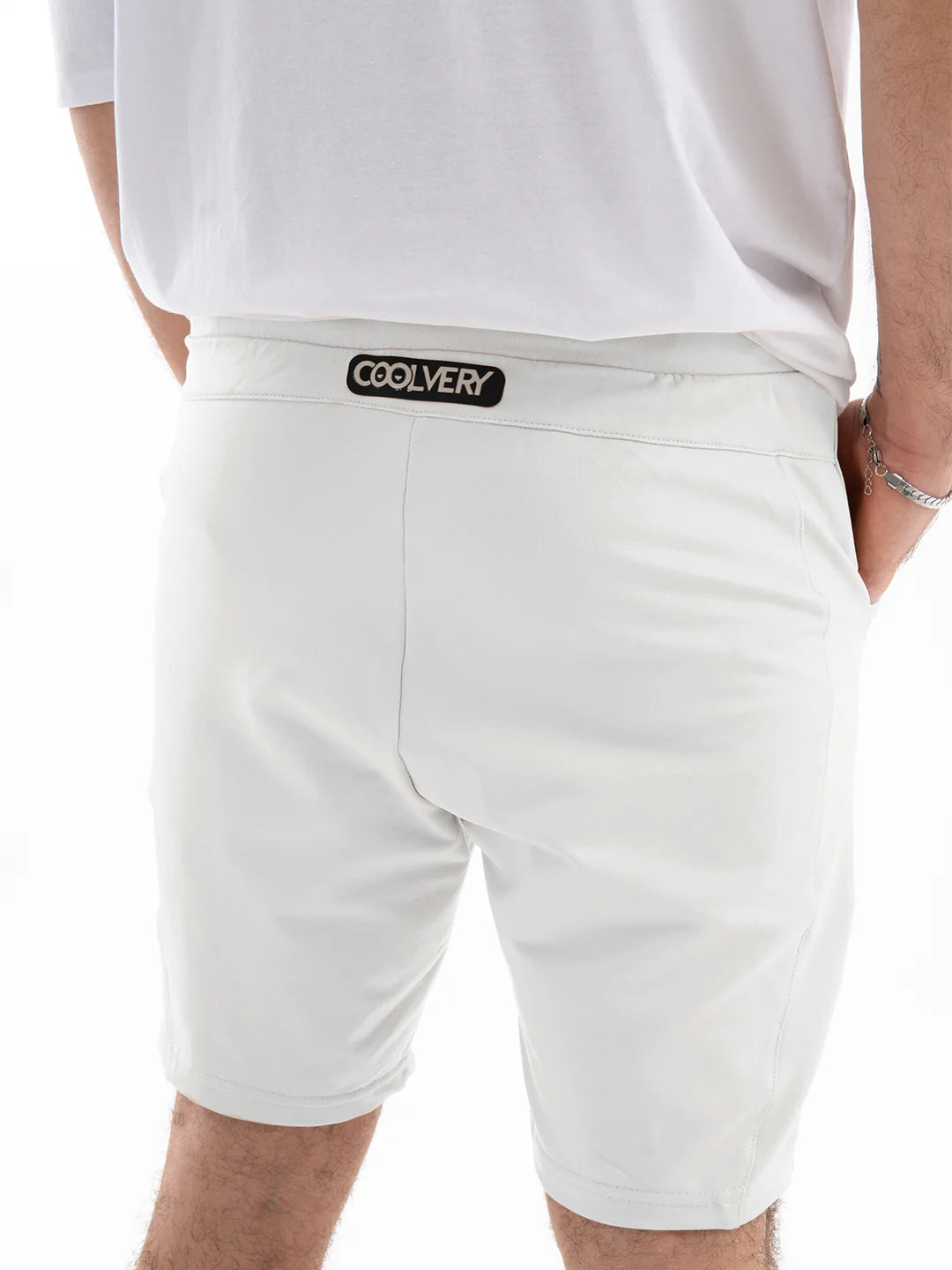 Detalle tela pantaloneta blanca hombre TENFIT