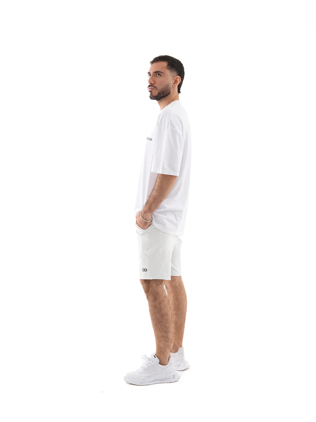 Pantaloneta blanca hombre TENFIT vista lateral