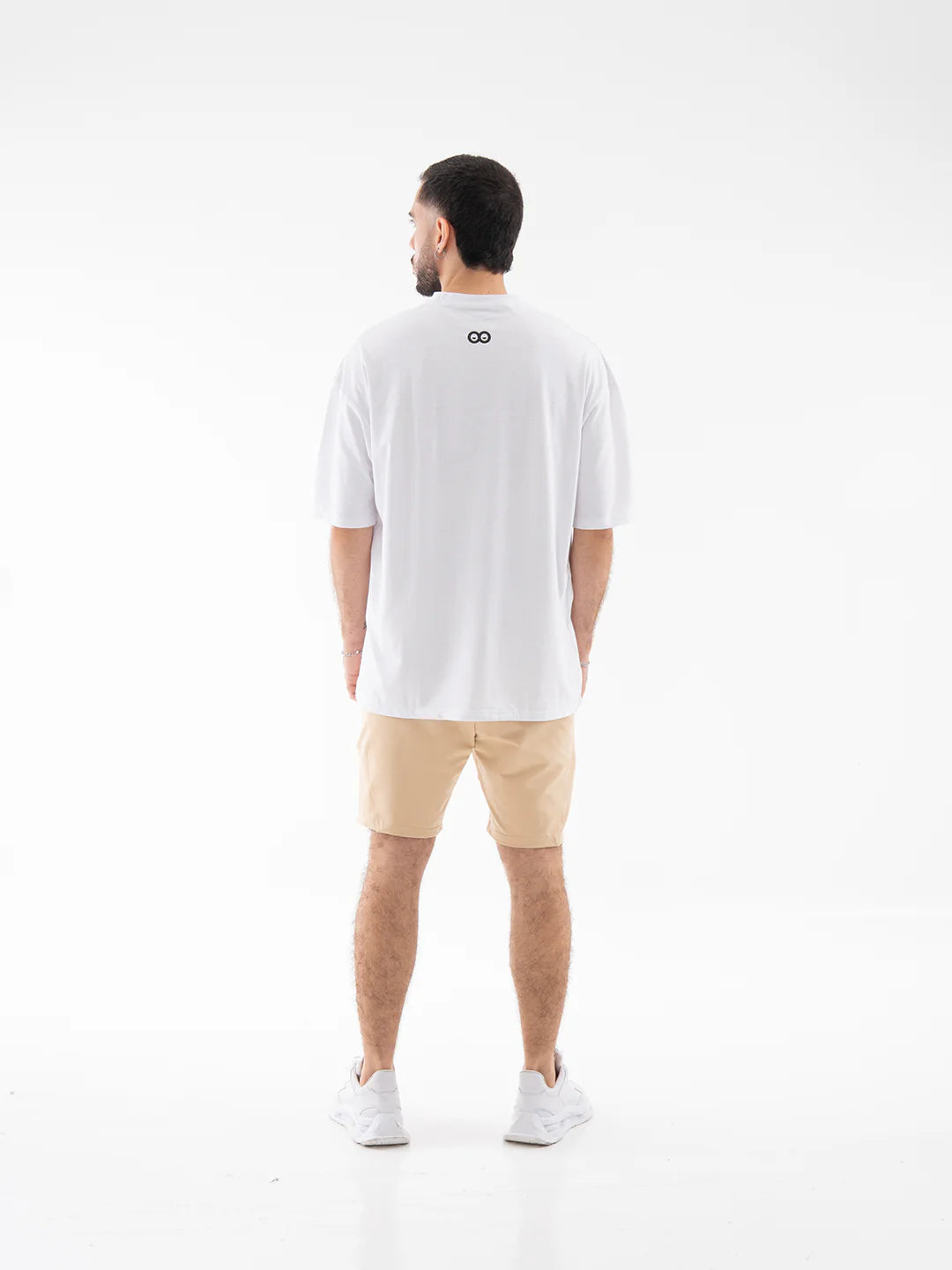 Pantaloneta caqui claro hombre TENFIT vista atrás