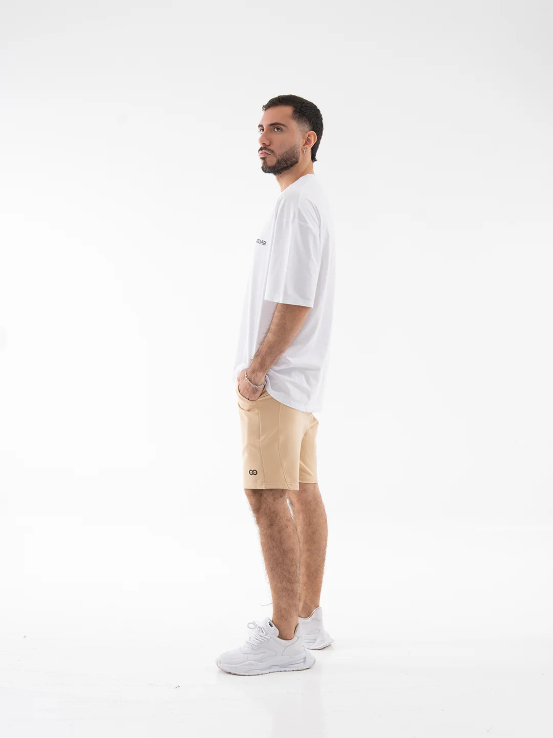 Pantaloneta caqui claro hombre TENFIT vista lateral