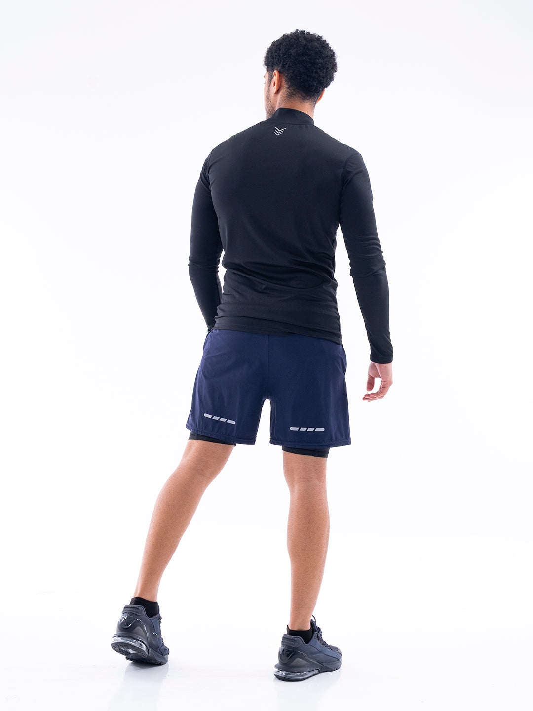 Pantaloneta NitroFit azul turquí atrás hombre TENFIT