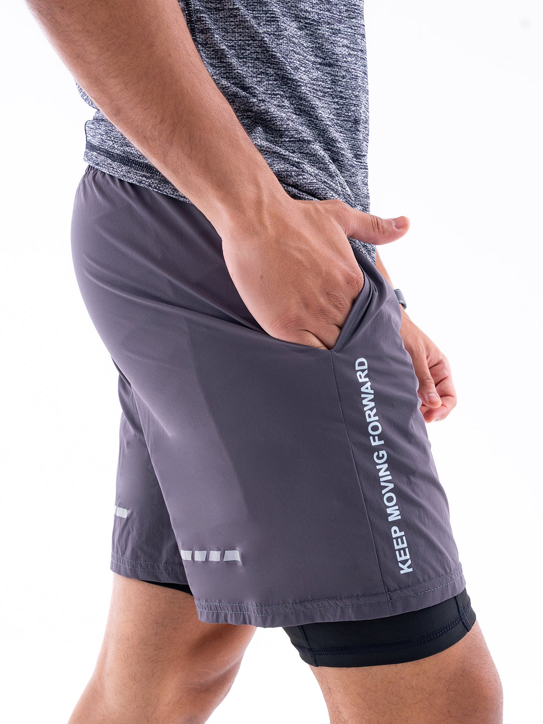 Detalle tejido pantaloneta gris oscuro gym TENFIT
