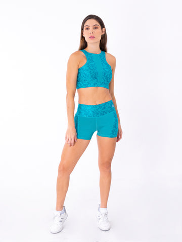 Short deportivo verde jade mujer TENFIT - vista frontal